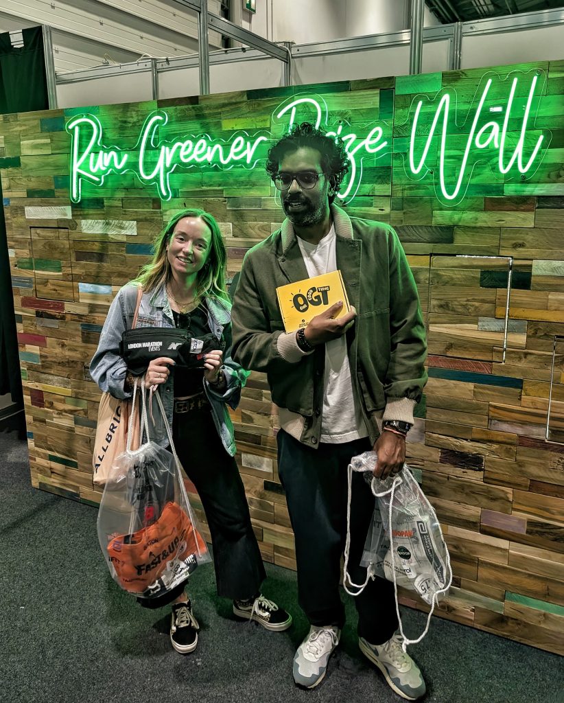 Romesh Ranganathan showing off his prize from the Noonah Prize Wall at the London Marathon Expo.