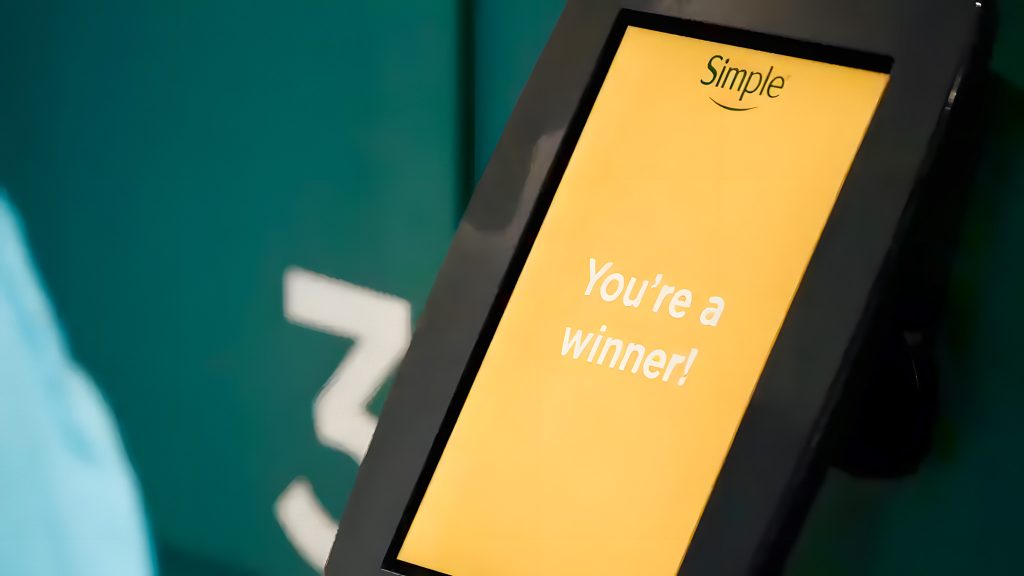 Close-up of the Prize Wall fully branded winner screen at the Simple Beauty event.