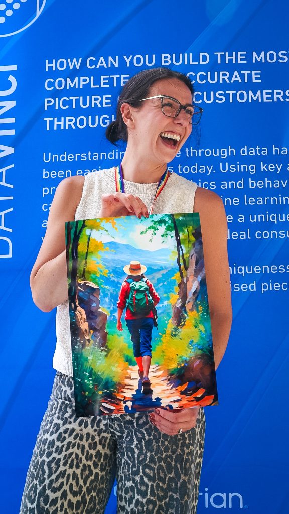 Guest laughing and showing off her AI-designed poster at a live event.