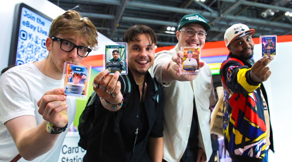 group of men proudly showing off their AI trading cards at Comic Con