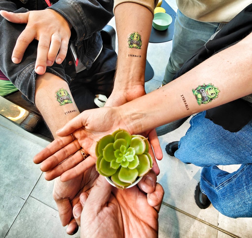Group showing off their AI Tattoos at brand event