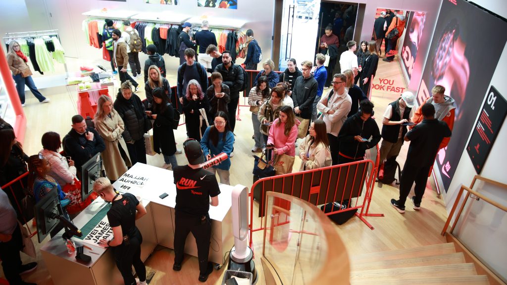 queue at nike town for personalised signs for london marathon
