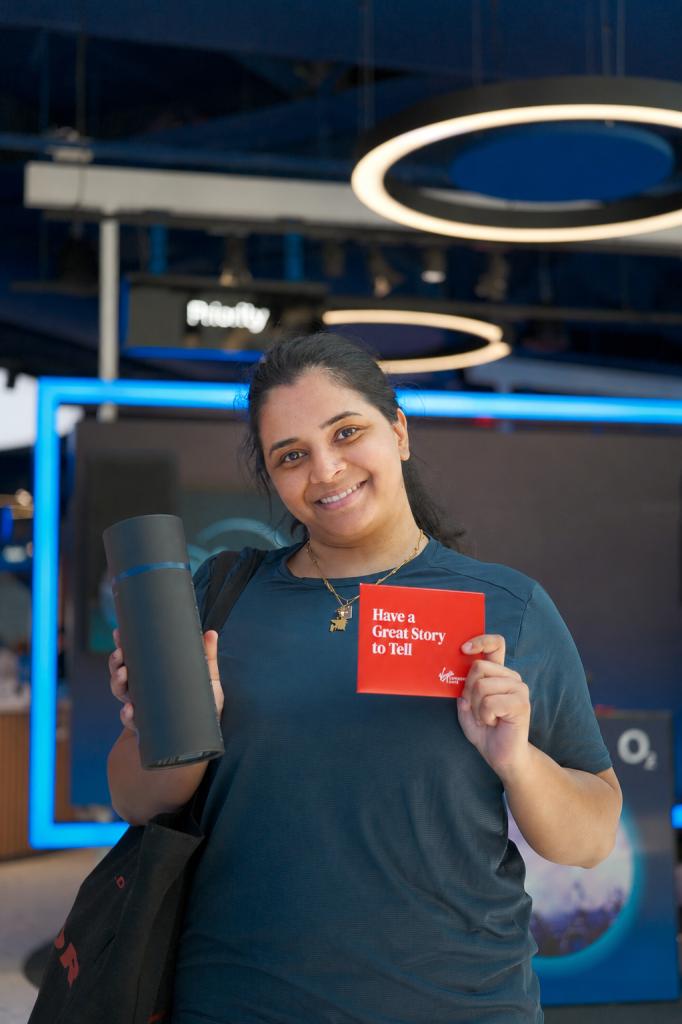 woman smiling in modern tech store
