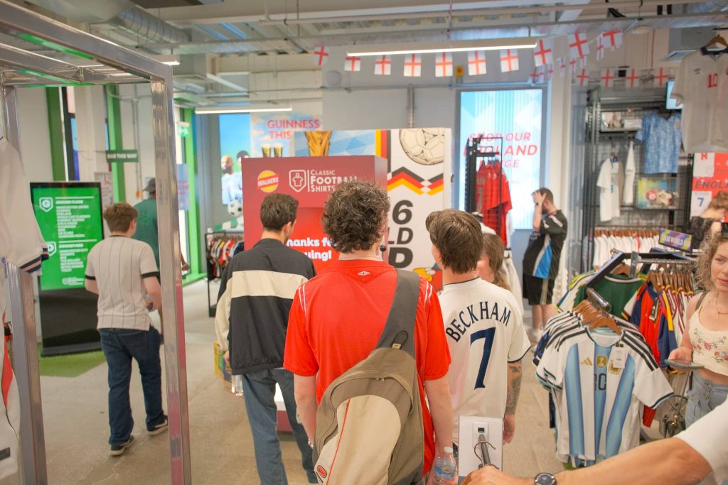 Crowd queueing to use walkers vending machine