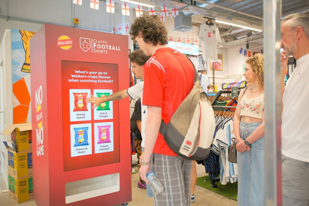 selecting favourite crisp flavour on walkers vending machine